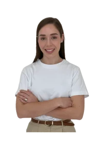 IMG_3964 Background Removed - Perfect Balance Rehabilitation Centre Portrait of a smiling woman with brown hair, wearing a white T-shirt and beige pants, arms crossed against a black background.