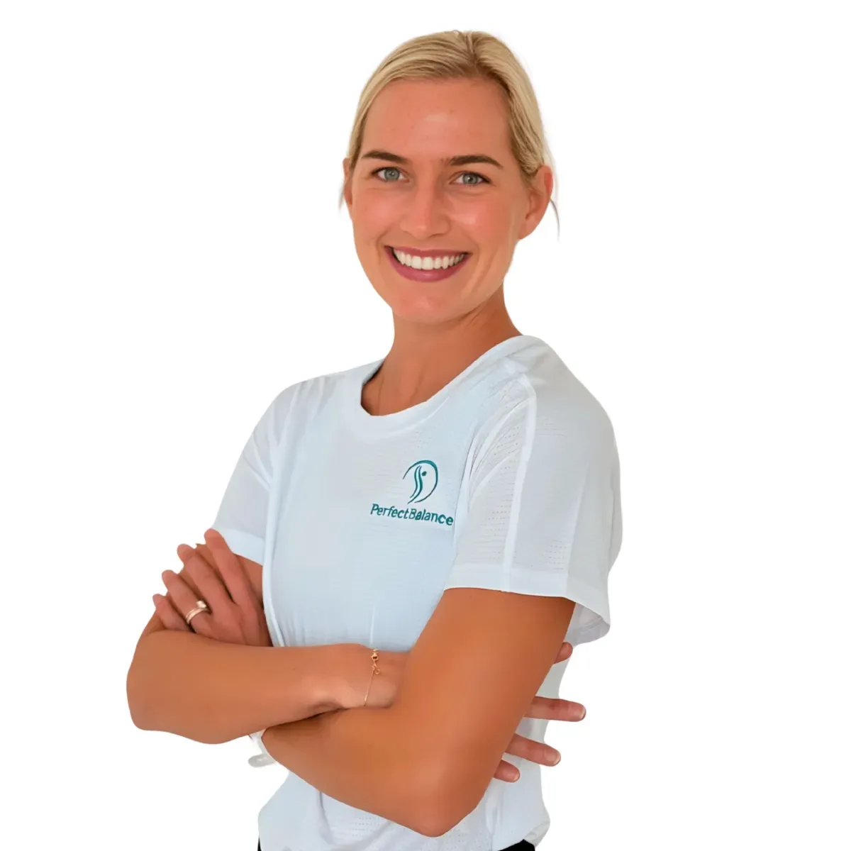 Portrait of a smiling woman with blonde hair wearing a white shirt with a PerfectBalance logo, arms crossed in front of her.